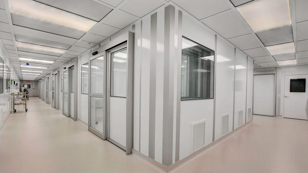Modular cleanroom by Allied Modular with enclosed panels, sliding doors, and integrated ventilation.