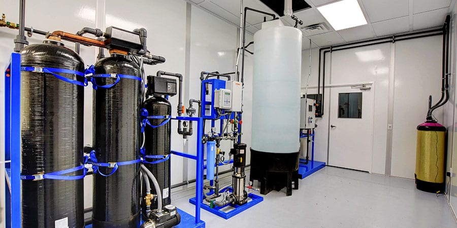 Water treatment system inside an Allied Modular cleanroom enclosure.
