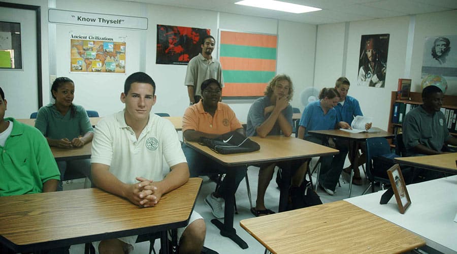 Students seated in a classroom inside an Allied Modular learning space, showcasing modular buildings for schools with bright interiors and functional layouts.