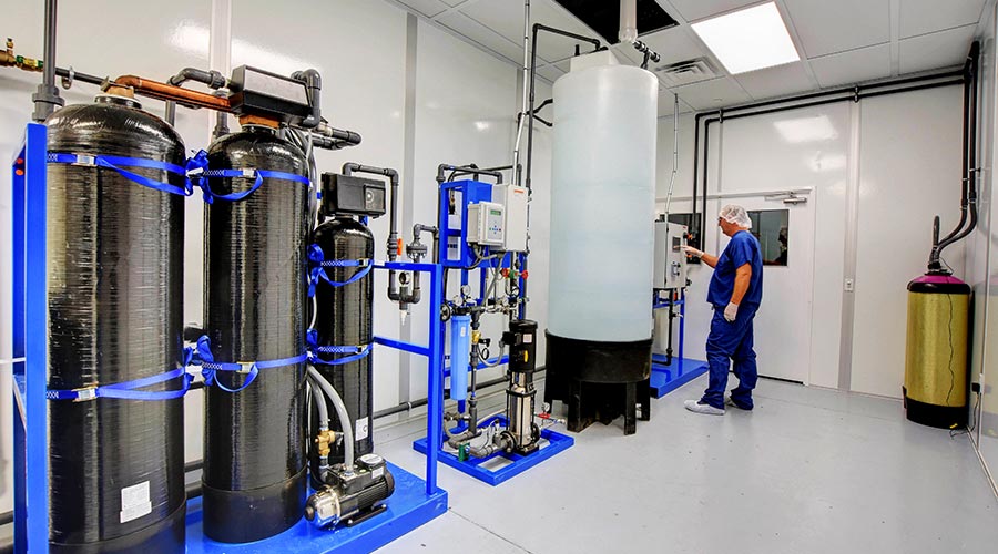 A modular cleanroom applications for a biotech company, with various machines inside.