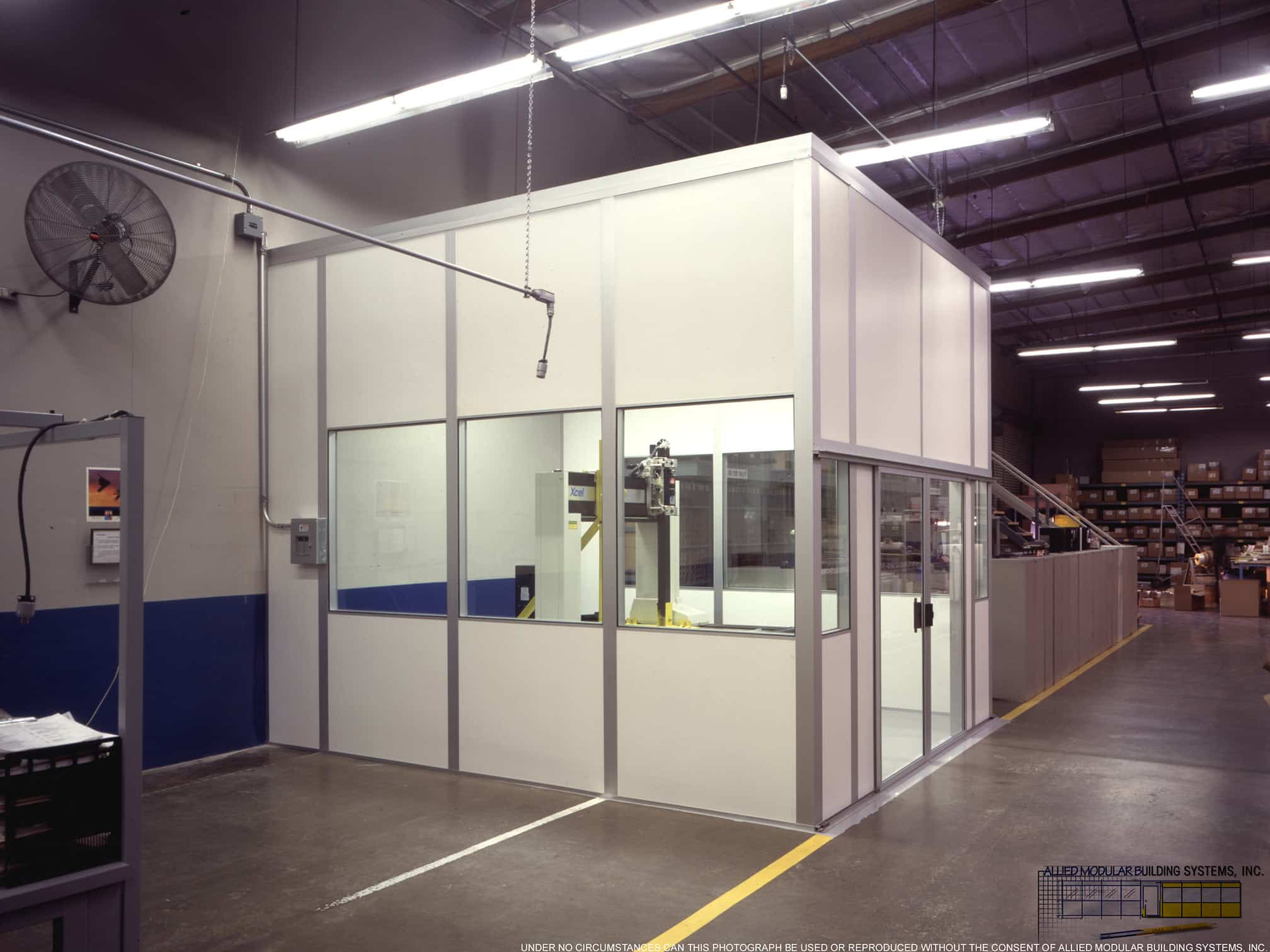 Modular CMM room with visible coordinate measuring machine inside, built by Allied Modular.