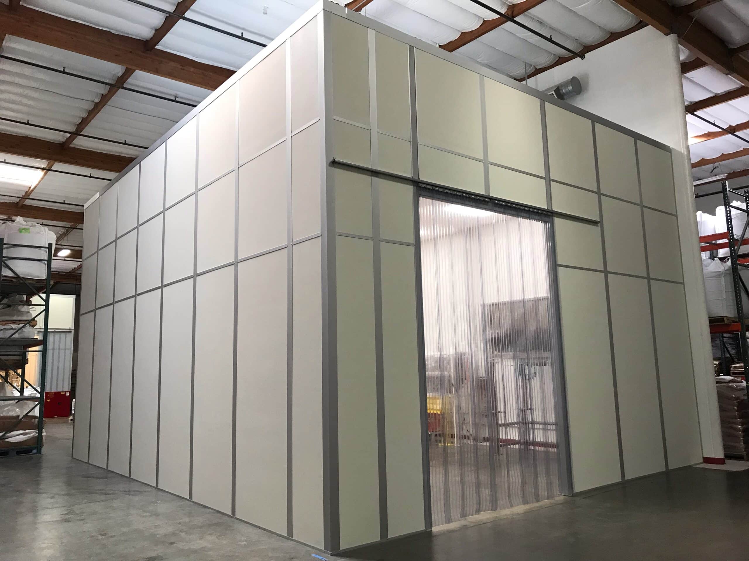 Tall walls used for a tool room within a factory.