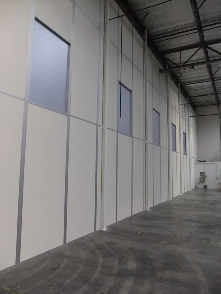 A tall demising wall system.