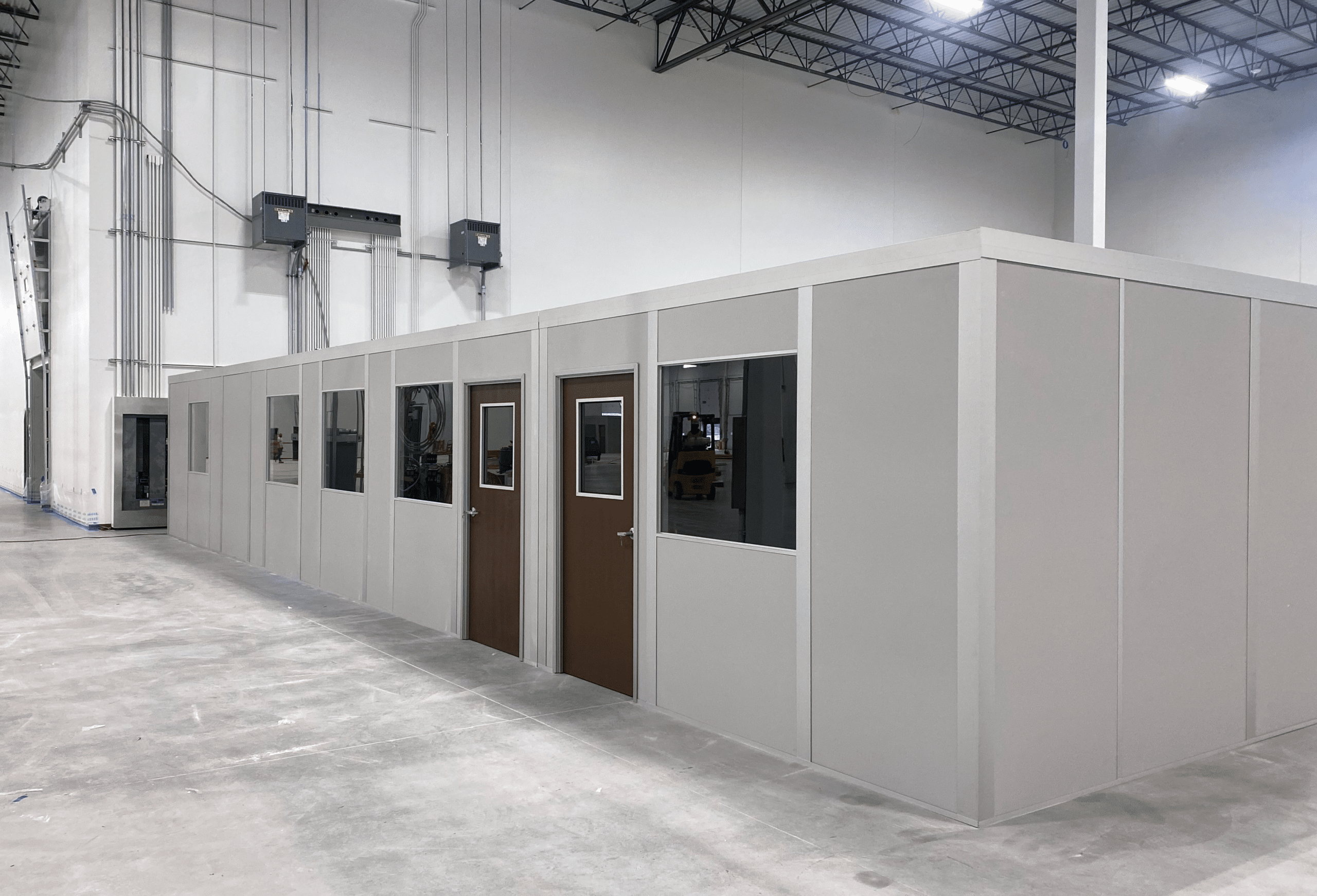 A modular in-plant office building. A modular office within a warehouse by allied modular inplant modular warehouse buildings Allied Modular multi inplant warehouse office