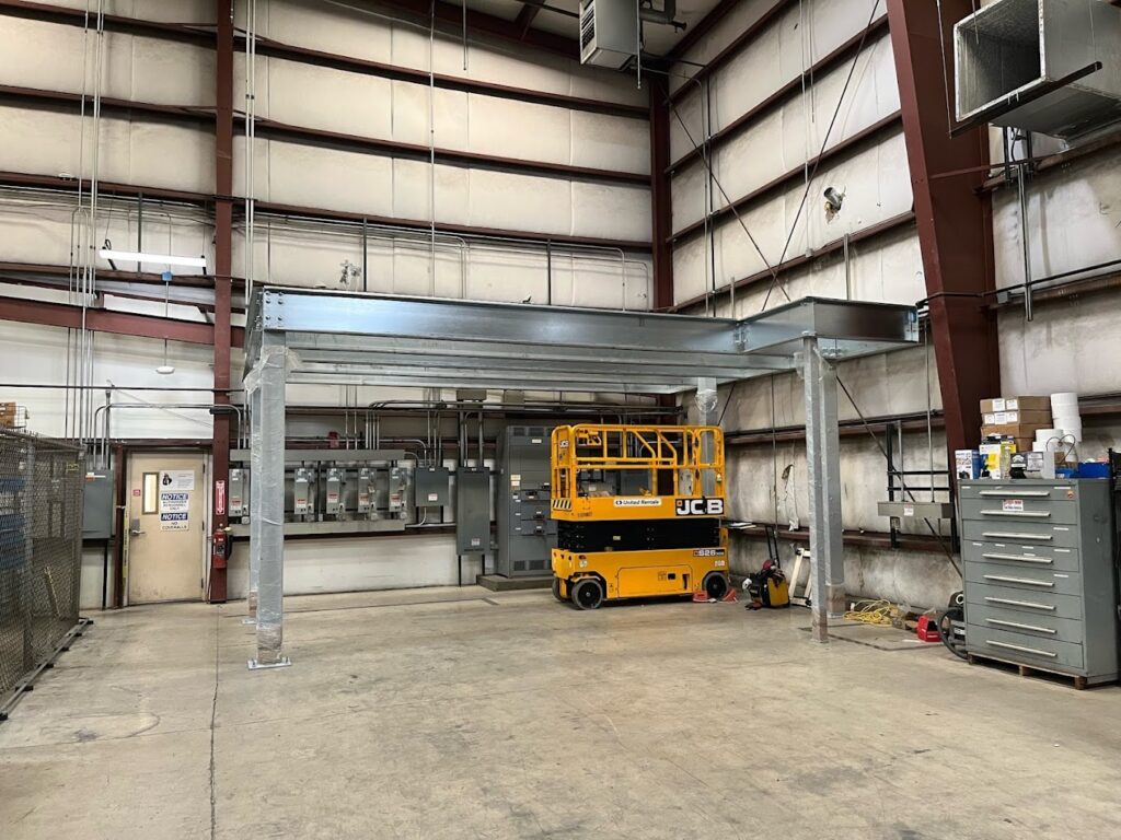 A steel mezzanine level under construction.