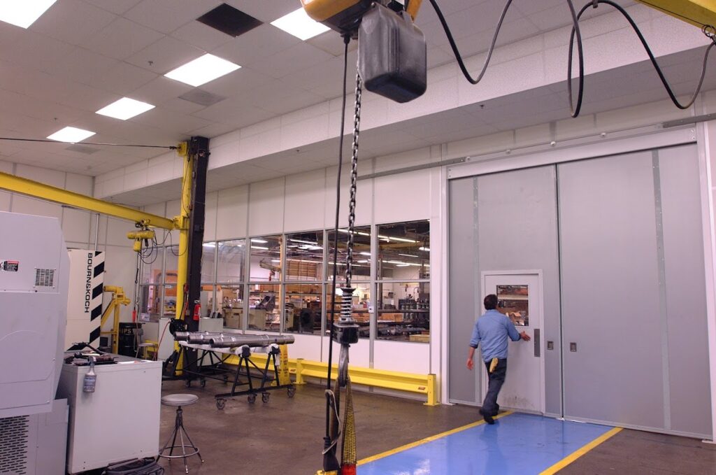 Tall Wall Machine Enclosure by Allied Modular - Modular Building systems - partition walls - warehouse separation walls