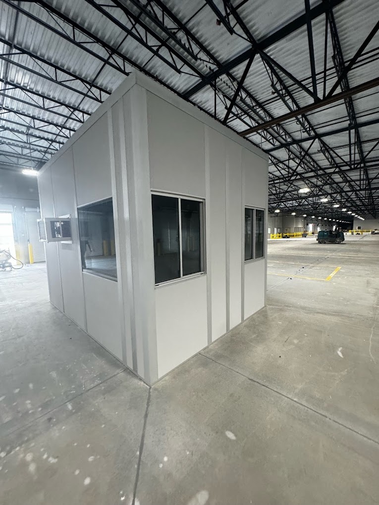 A modular cool down room in a warehouse, designed to provide a climate-controlled space where workers can cool off and recover from heat exposure.